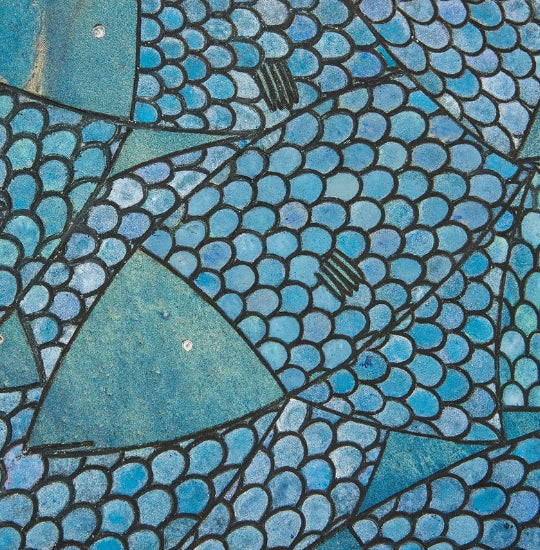 A close up showing hand painted blue sardines by Seth B Minkin
