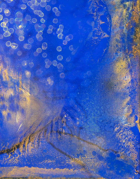 Painting with bright golden tones against deep cobalt, depicting the mesmerizing scene of fireflies illuminating a twilight sky.