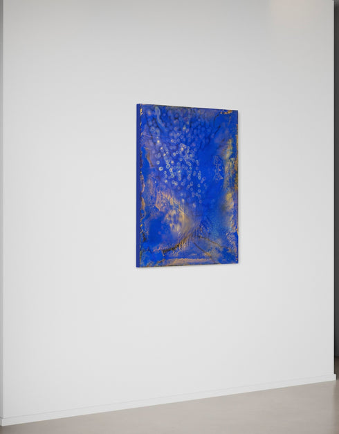 Painting with bright golden tones against deep cobalt, depicting the mesmerizing scene of fireflies illuminating a twilight sky.