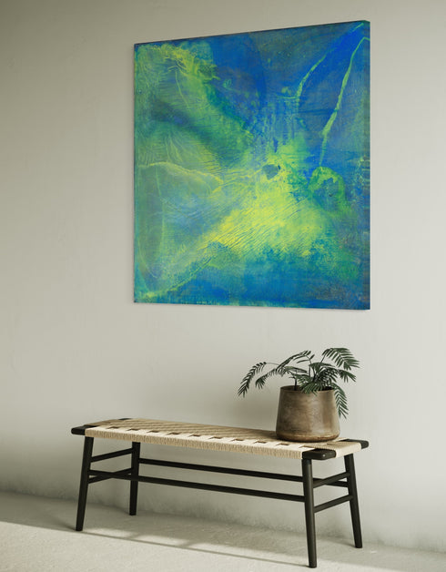 Painting with blue-green hues and bright yellow accents, inspired by the 1970s Big Wheel, evoking childhood joy and adventure.