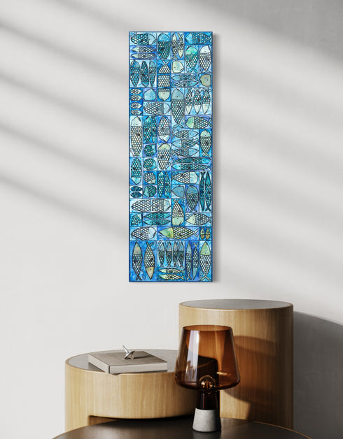 12"x36" painting with whimsical sardines in blues and greens, inspired by the charm of a tackle box.