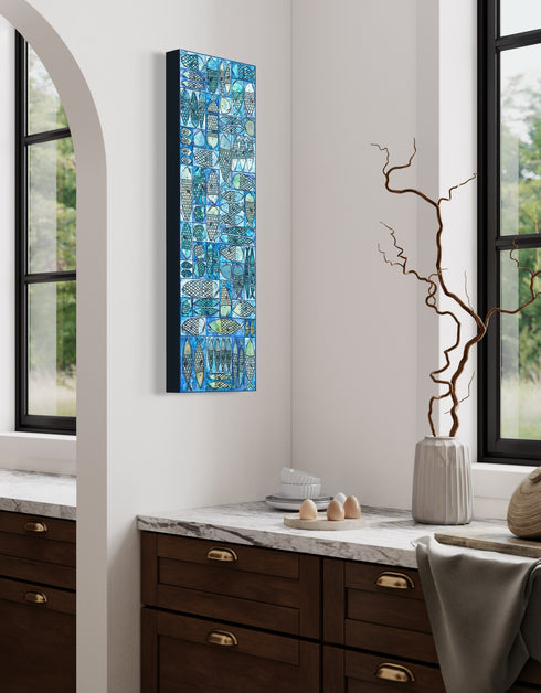 12"x36" painting with whimsical sardines in blues and greens, inspired by the charm of a tackle box.